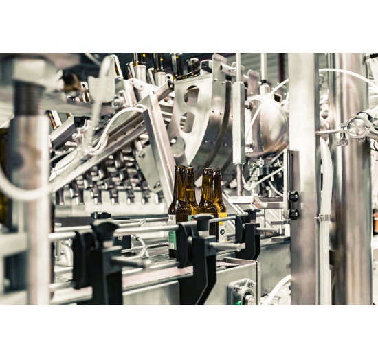 Automatic filling line, bottle spraying + filling bottles with a drink
